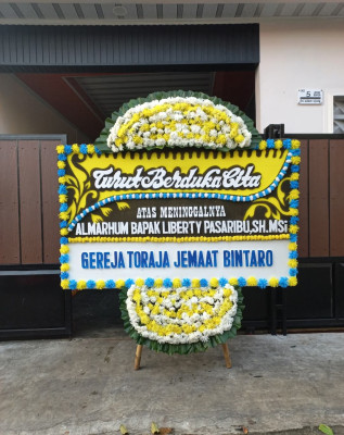 Papan Bunga Duka di Parbuluan